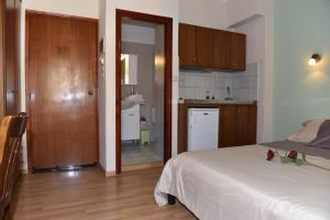 Postel nebo postele na pokoji v ubytování 40 Platania Hotel