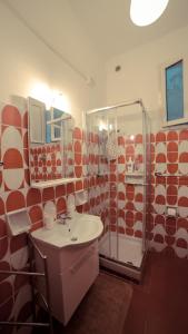 Un baño de Appartamento Rosa 32 fotos más