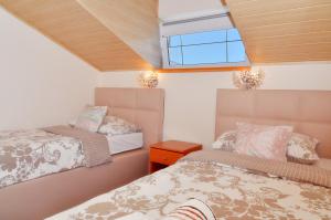 Postel nebo postele na pokoji v ubytování Villa Vanilla with Heated Pool