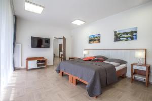 Postel nebo postele na pokoji v ubytování Greensgate Hotel Dýšina