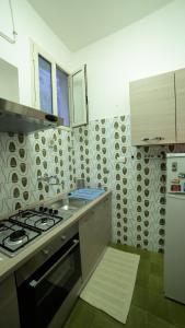 A cozinha ou cozinha compacta de Appartamento Rosa