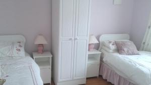 Voodi või voodid majutusasutuse Laurel Lodge toas