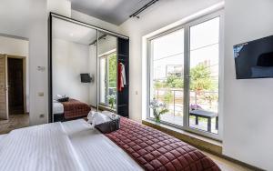 TV a/nebo společenská místnost v ubytování Hotel Sorrento
