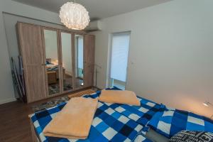 Giường trong phòng chung tại ARENA Apartment 5-Stars Premium-Accommodation