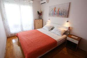 Postel nebo postele na pokoji v ubytování Beach Apartment Dagama