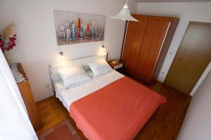Postel nebo postele na pokoji v ubytování Beach Apartment Dagama