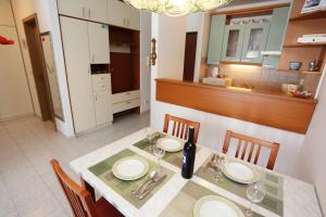 Kuchyň nebo kuchyňský kout v ubytování Beach Apartment Dagama