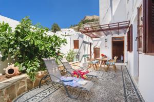 A balcony or terrace at Thea Villas and Suite