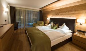 Posteľ alebo postele v izbe v ubytovaní Hotel Grien