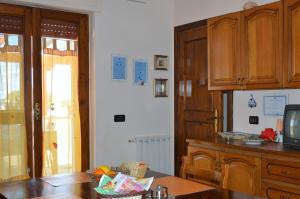 Kuchyň nebo kuchyňský kout v ubytování Casa delle Rondini