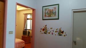 Posteľ alebo postele v izbe v ubytovaní Yilan Xiang Feng Homestay