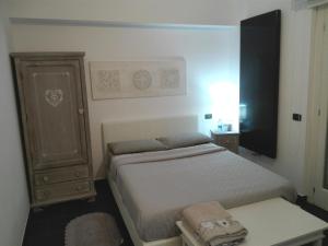 Posteľ alebo postele v izbe v ubytovaní B&B Stazione Latina