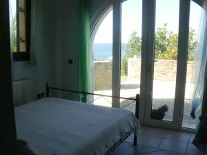 Posteľ alebo postele v izbe v ubytovaní Charly Point Villa