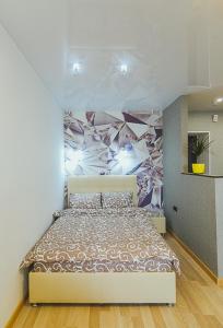 a bedroom with a bed in a room at VIP apartmen in Sumy