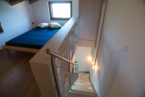 Postel nebo postele na pokoji v ubytování Residenza Lombardi