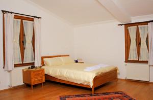 Giường trong phòng chung tại Misanli Pansiyon