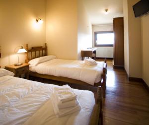 Cama o camas de una habitación en Casa Rural Maialde