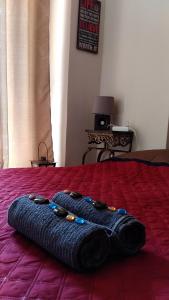 a large blue blanket laying on a bed at Beautiful apartments in Kavala in Kavála