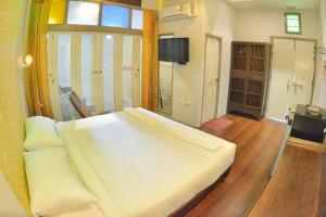 Кровать или кровати в номере Sleep Hotel - SHA Certified