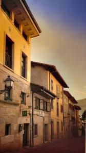 an old building with a street in front of it at Casa Rural Maialde in Elgeta