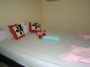 Postel nebo postele na pokoji v ubytování Serenity Homestay