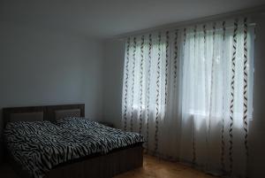 Letto o letti in una camera di Gogi Jafaridze's Guesthouse