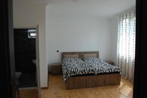 Letto o letti in una camera di Gogi Jafaridze's Guesthouse