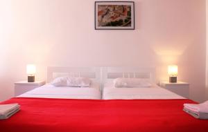 Postel nebo postele na pokoji v ubytování Illy City Centre Apartment