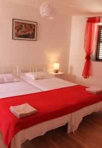 Postel nebo postele na pokoji v ubytování Illy City Centre Apartment