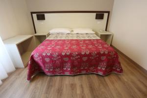 Postel nebo postele na pokoji v ubytování Hotel Europa