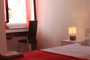 Postel nebo postele na pokoji v ubytování Illy City Centre Apartment