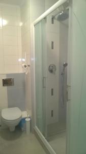 Kúpeľňa v ubytovaní Apartament Raz Dwa Trzy