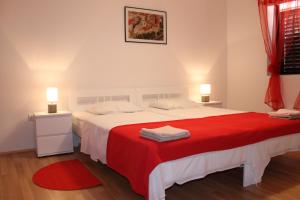 Postel nebo postele na pokoji v ubytování Illy City Centre Apartment