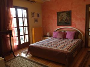 A bed or beds in a room at Villa Voirani Még 37 kép