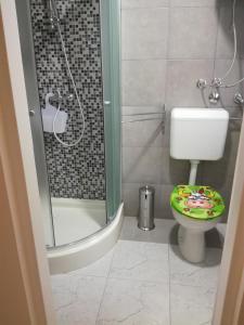 Kúpeľňa v ubytovaní Apartments Olivia