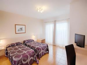 Postel nebo postele na pokoji v ubytování Hotel Ucanca