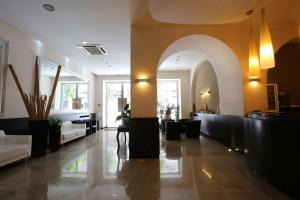 Postel nebo postele na pokoji v ubytování Hotel Europa