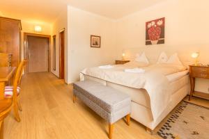 Postel nebo postele na pokoji v ubytování Hotel Schloss Lerchenhof