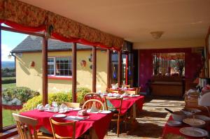 A restaurant or other place to eat at Findus House, Farmhouse Bed & Breakfast