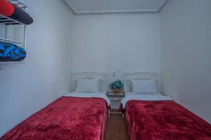 Postel nebo postele na pokoji v ubytování Hotel Zaitoune