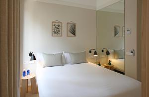 Katil atau katil-katil dalam bilik di The Moods Catedral Hostal Boutique