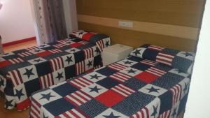 Postel nebo postele na pokoji v ubytování Hostal Lima