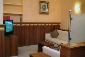 TV a/nebo společenská místnost v ubytování Hotel Sole