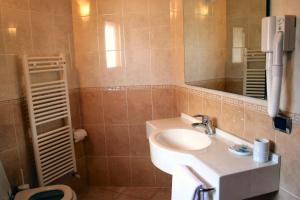 Koupelna v ubytování Hotel Sole