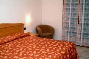 Postel nebo postele na pokoji v ubytování Hotel Sole