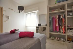Postel nebo postele na pokoji v ubytování Hotel Sabrina Rimini