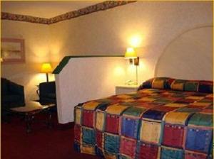 Postel nebo postele na pokoji v ubytování O'Hare Inn & Suites