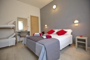 Postel nebo postele na pokoji v ubytování Hotel Sabrina Rimini