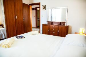 Posteľ alebo postele v izbe v ubytovaní La Mia Apartment