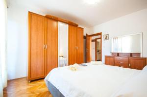 Posteľ alebo postele v izbe v ubytovaní La Mia Apartment